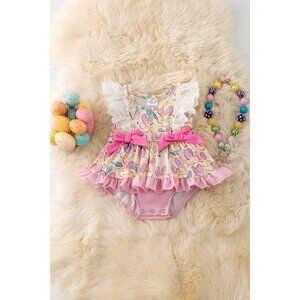 Lilac, blue & fuchsia twirl onesie with side bows. RPG50210 SOL